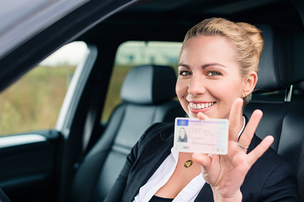 An image of a woman who has her driving licence